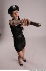 NIKITA POLICEWOMAN WITH TWO GUNS